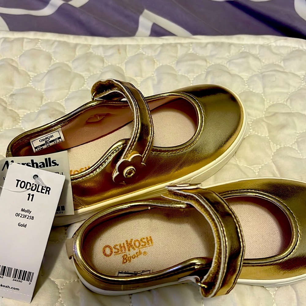Toddler girls gold shoes. Size 11 brand new with tags. Rubber soles.